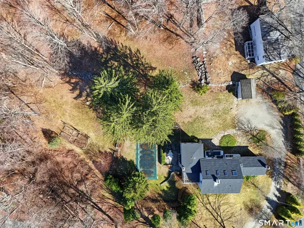 an aerial view of houses with yard