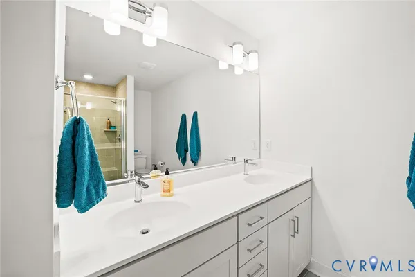 a bathroom with a shower and a toilet