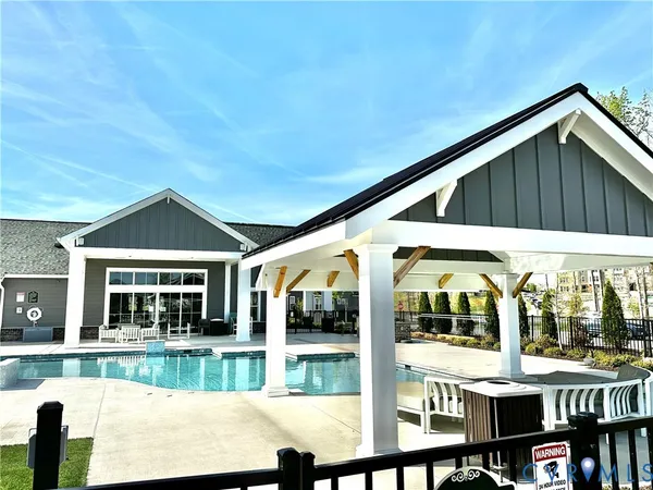 a outdoor space with swimming pool and porch