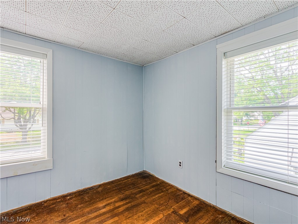 880 West Riddle Avenue Ravenna, OH 44266 - Photo 11 of 14 Bedroom with a drop ceiling and hardwood / wood-style floors