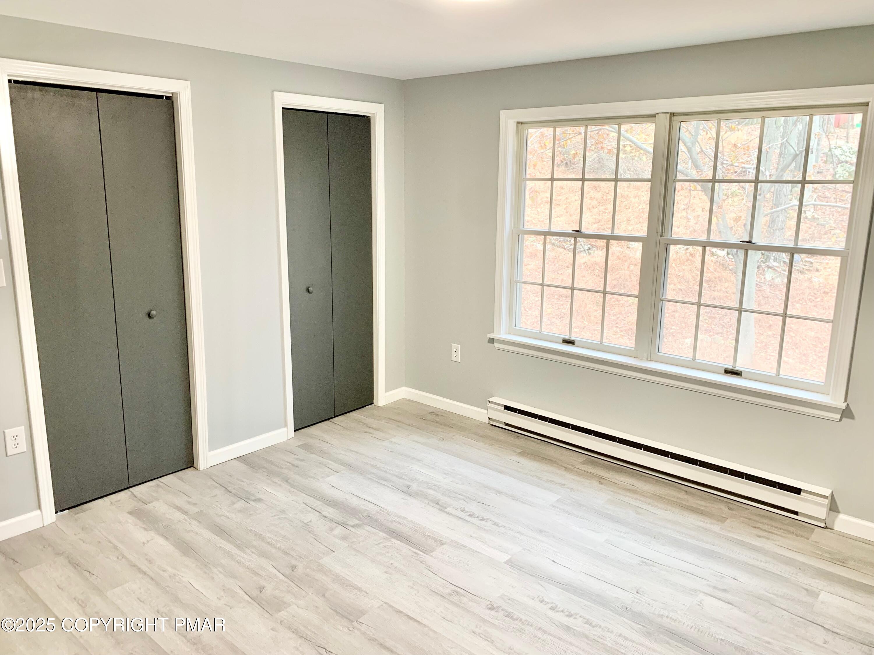 111 Lake In The Clouds Road Canadensis, PA 18325 - Photo 23 of 39 a view of an empty room with a window