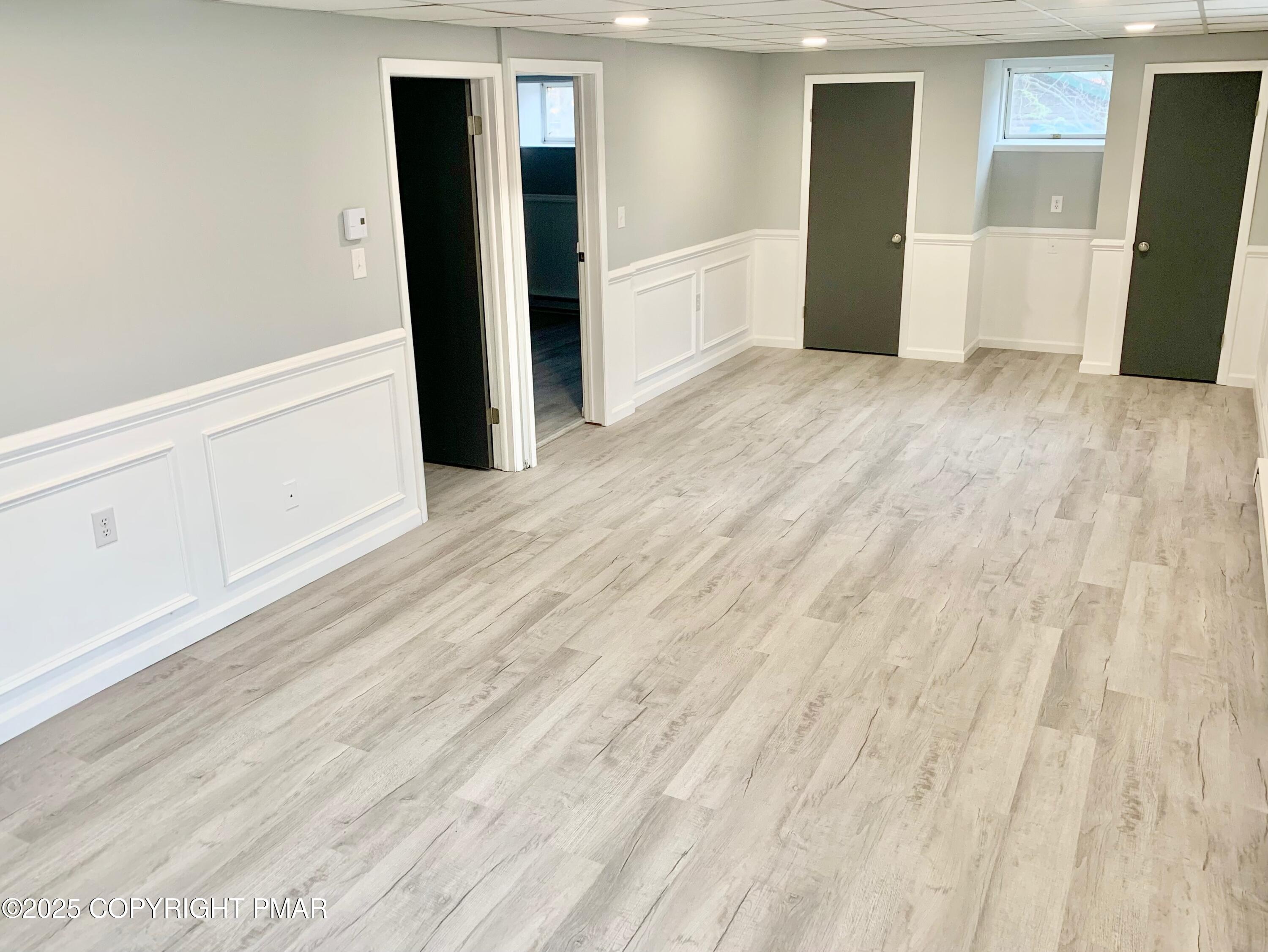 111 Lake In The Clouds Road Canadensis, PA 18325 - Photo 31 of 39 wooden floor in an empty room