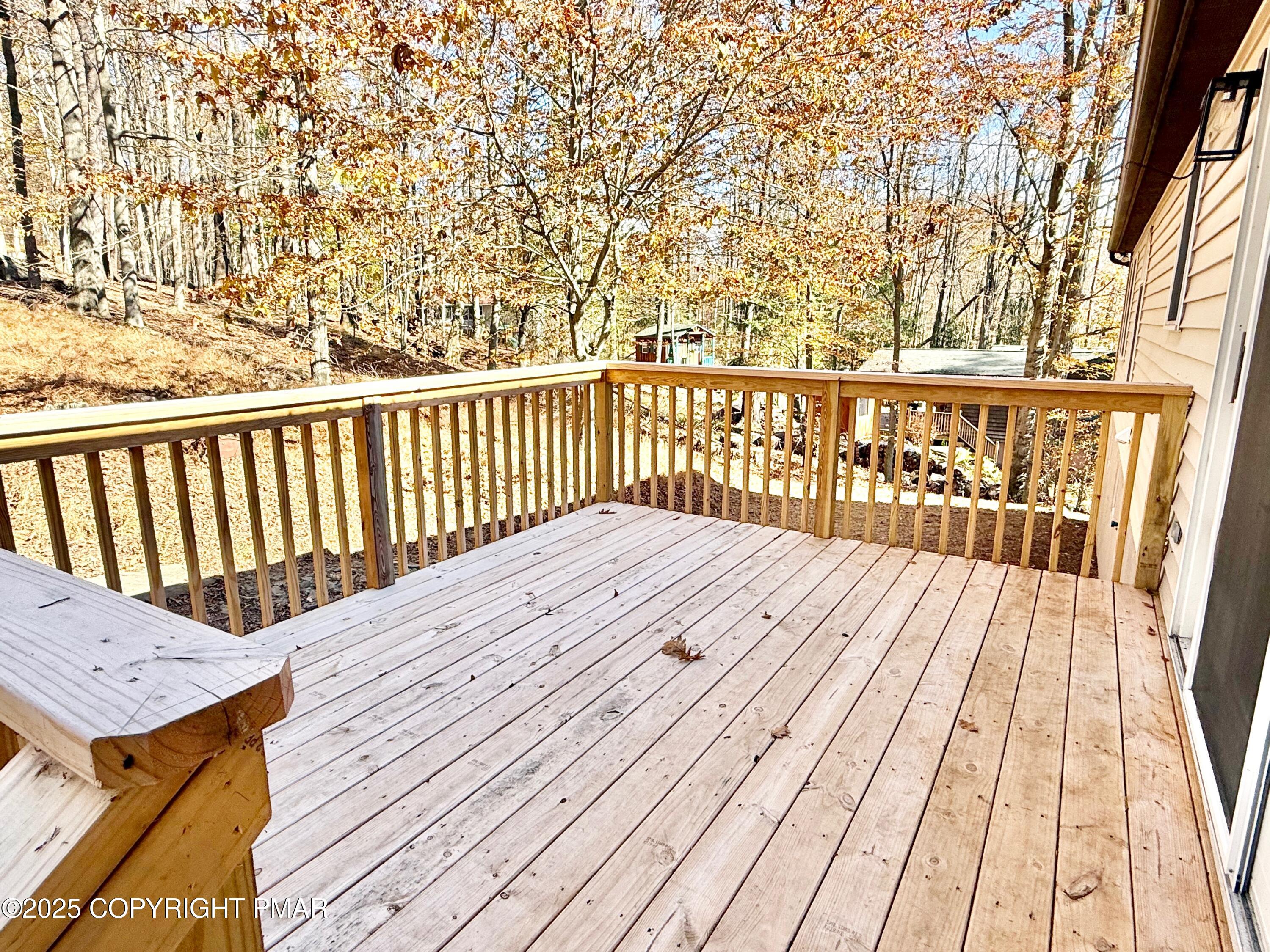 111 Lake In The Clouds Road Canadensis, PA 18325 - Photo 36 of 39 a view of balcony with wooden floor