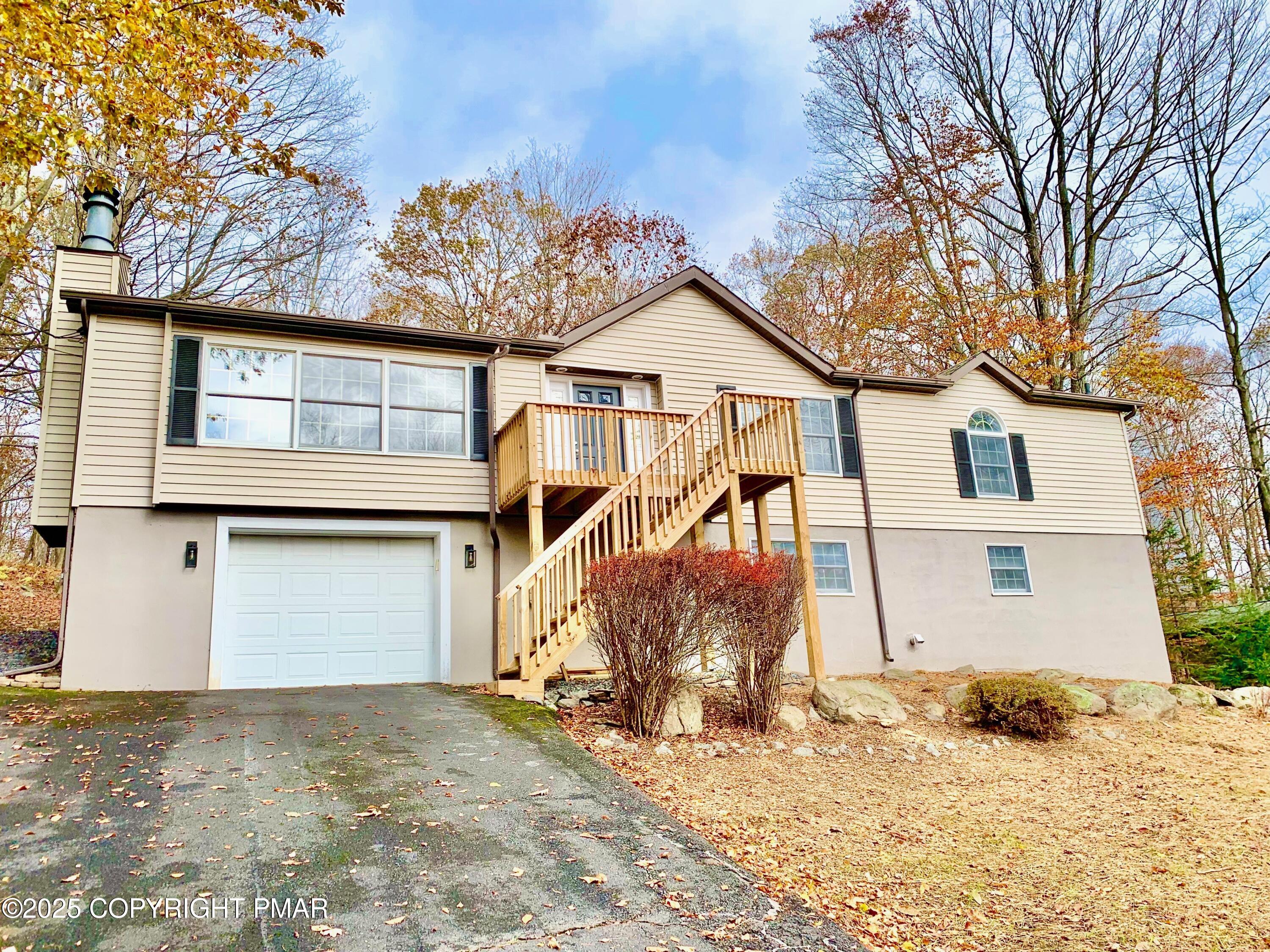 111 Lake In The Clouds Road Canadensis, PA 18325 - Photo 38 of 39 a view of a house with snow on the side of the road