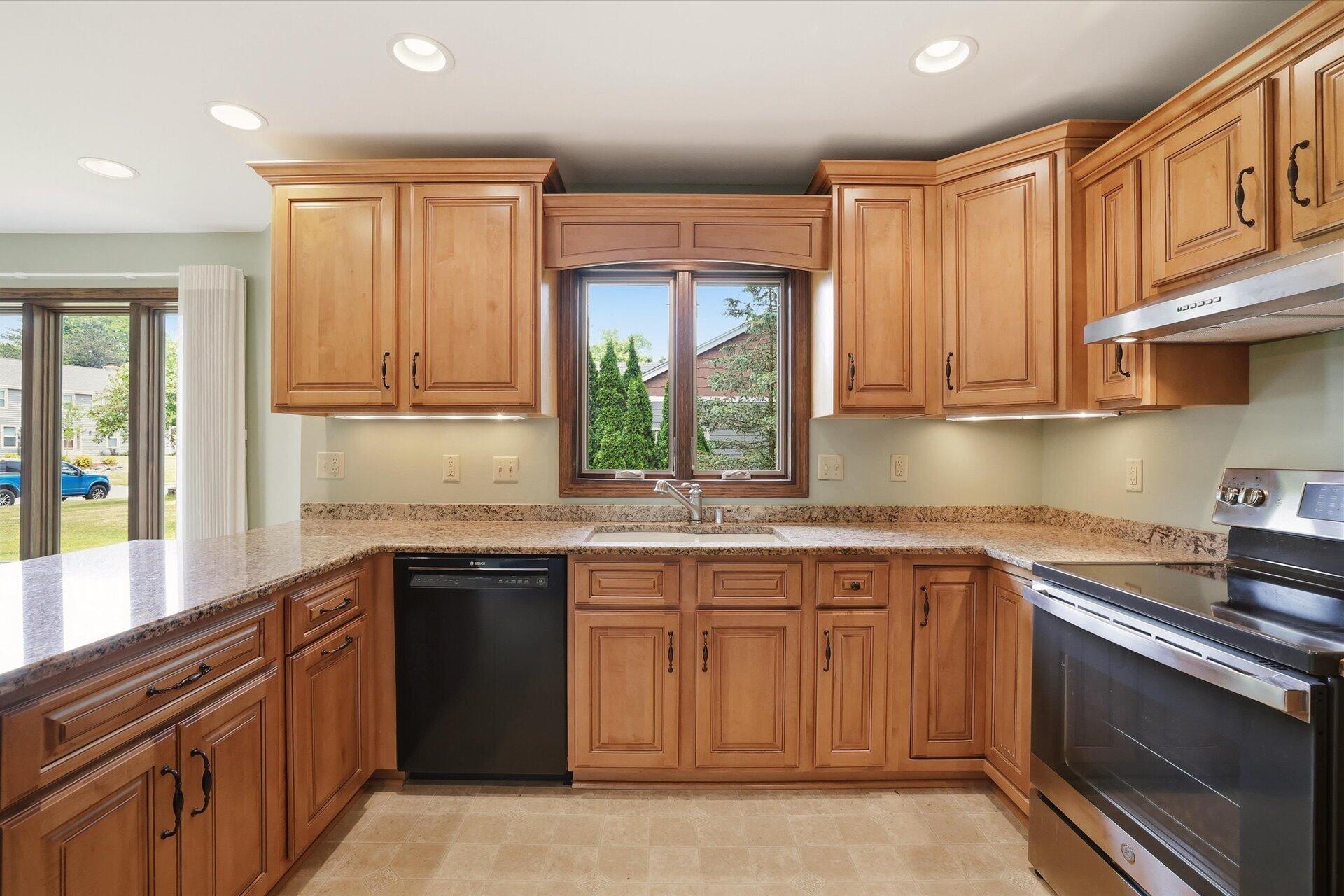 4100 South 119th Street Greenfield, WI 53228 - Photo 27 of 31 Abundant granite countertop space!