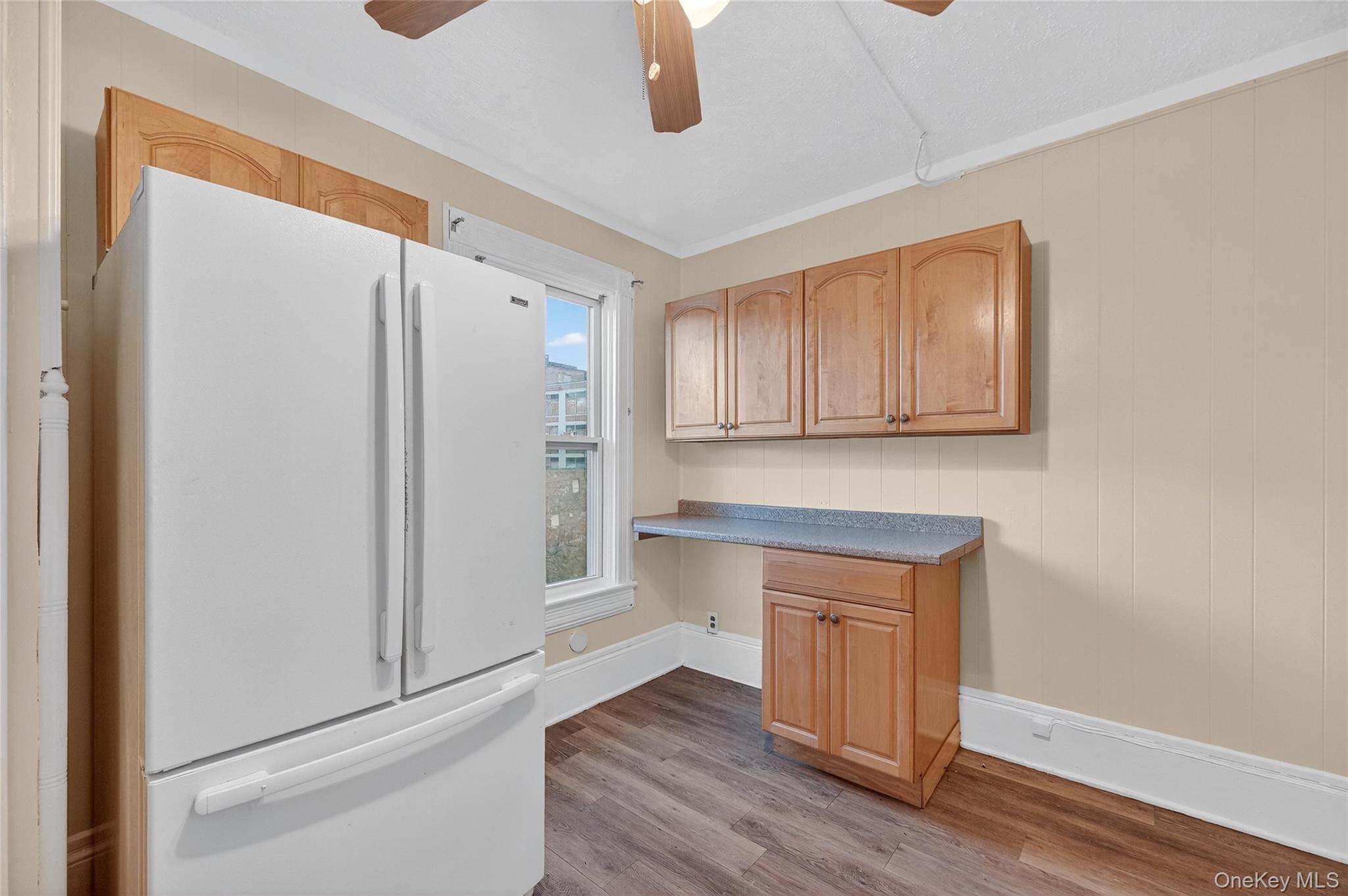 11 Zimmer Avenue, Unit 2 Poughkeepsie, NY 12601 - Photo 12 of 27 a kitchen with a refrigerator and window