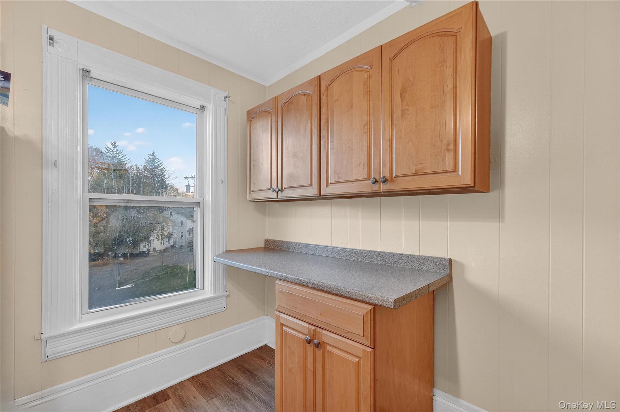 11 Zimmer Avenue, Unit 2 Poughkeepsie, NY 12601 - Photo 15 of 27 a view of a sink a microwave and cabinets
