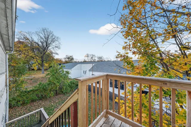 a view of a street from a balcony