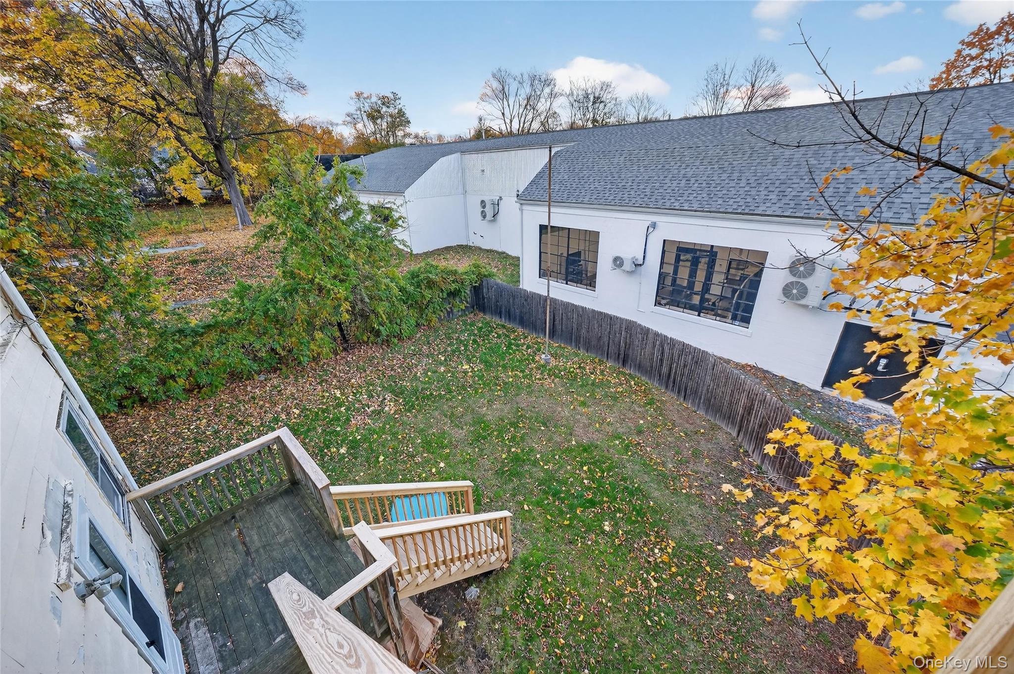 11 Zimmer Avenue, Unit 2 Poughkeepsie, NY 12601 - Photo 26 of 27 a view of a house with a yard