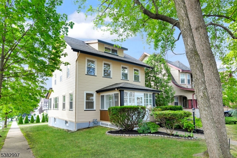 195 Sylvan Street Rutherford, NJ 07070 - Photo 11 of 50 a view of a house with a yard and plants