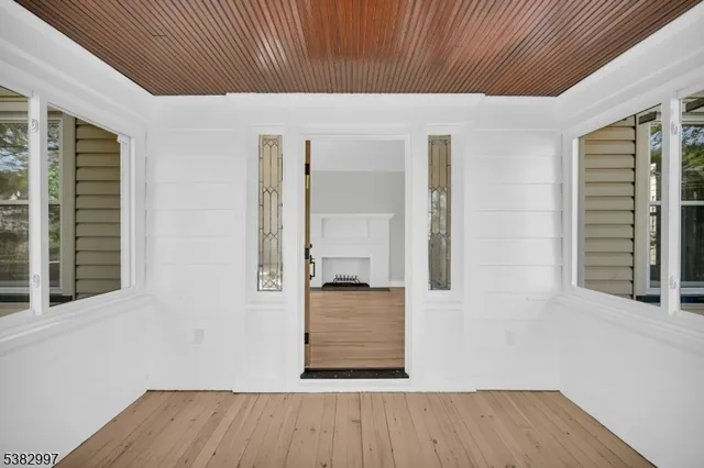 a view of a porch in front of a house