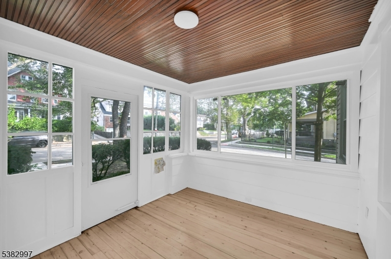 195 Sylvan Street Rutherford, NJ 07070 - Photo 13 of 50 a view of a porch in front of a house