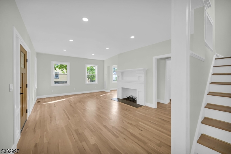 195 Sylvan Street Rutherford, NJ 07070 - Photo 27 of 50 wooden floor in an empty room with a window