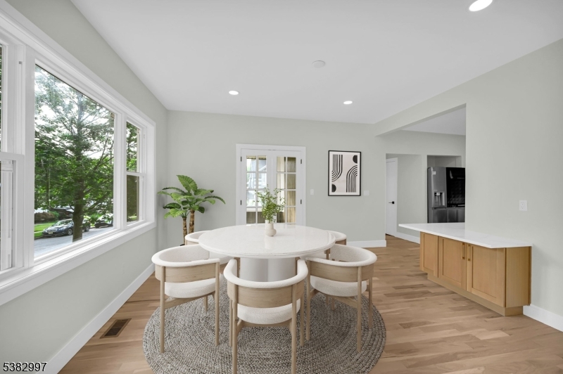 195 Sylvan Street Rutherford, NJ 07070 - Photo 4 of 50 a view of a dining room with furniture window and outside view