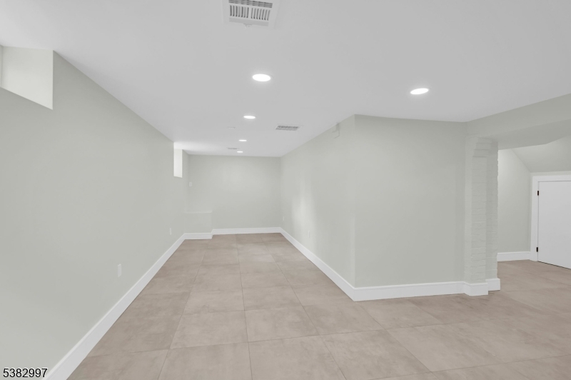 195 Sylvan Street Rutherford, NJ 07070 - Photo 45 of 50 an empty room with a empty space