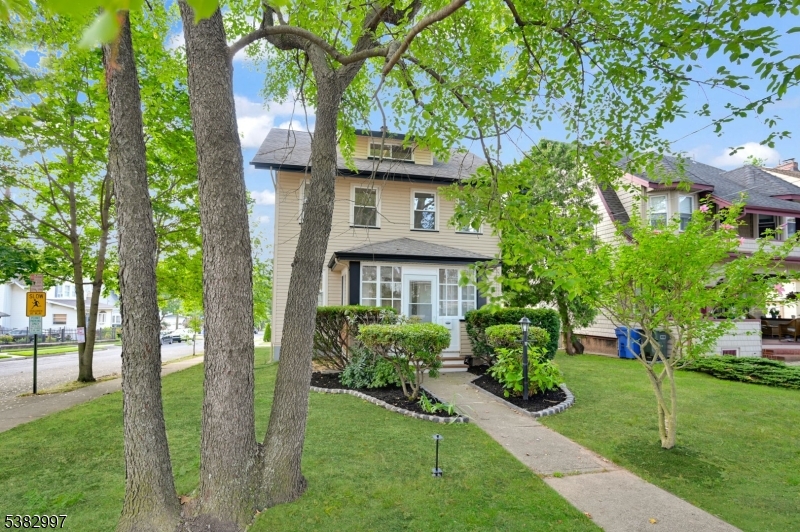 195 Sylvan Street Rutherford, NJ 07070 - Photo 9 of 50 a view of house with a yard