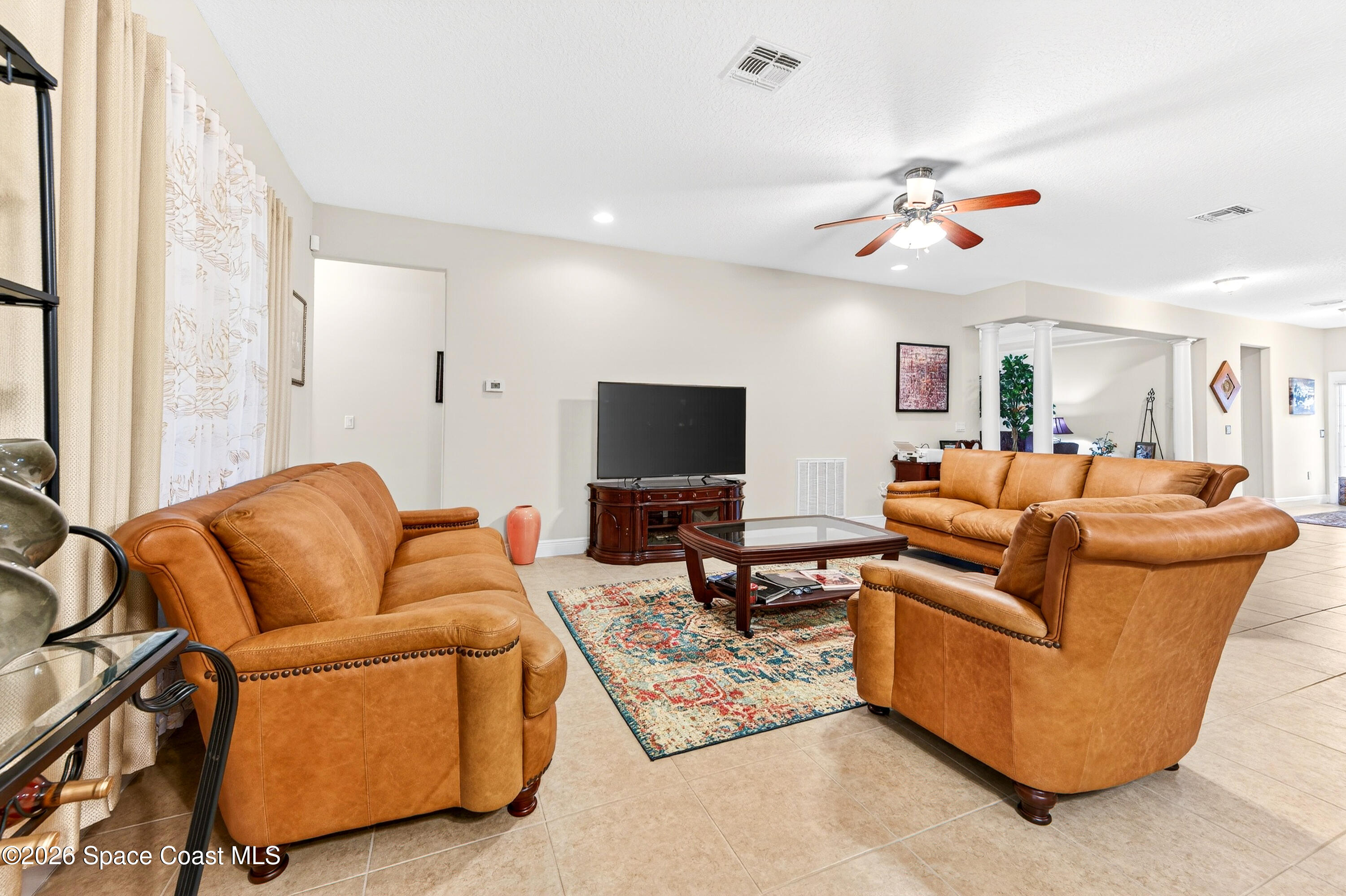 3347 Slate Street Melbourne, FL 32904 - Photo 15 of 48 18x18 Neutral Tile/Curtains remain