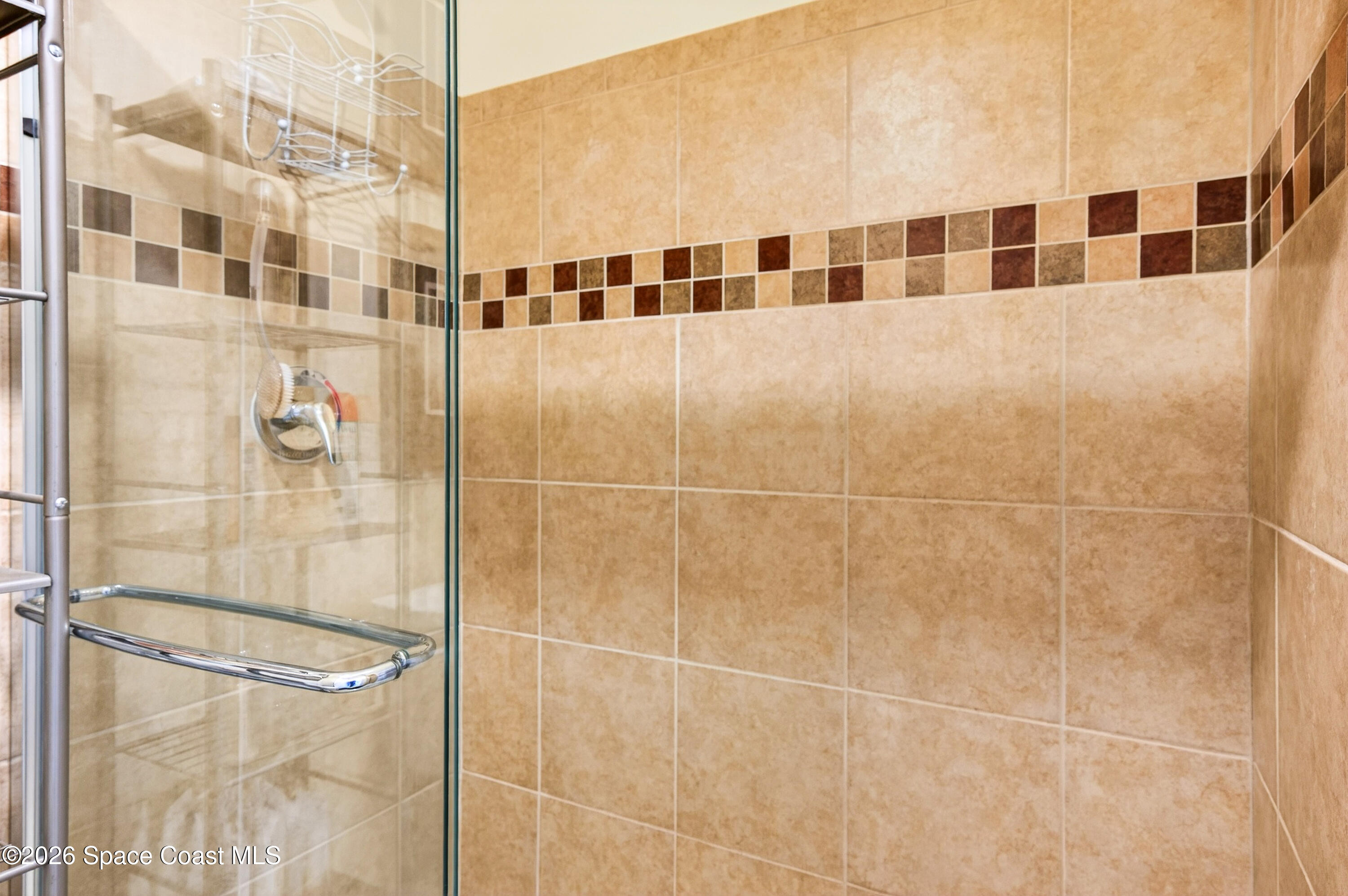 3347 Slate Street Melbourne, FL 32904 - Photo 28 of 48 Decorative Tile Shower w/Glass Enclosure