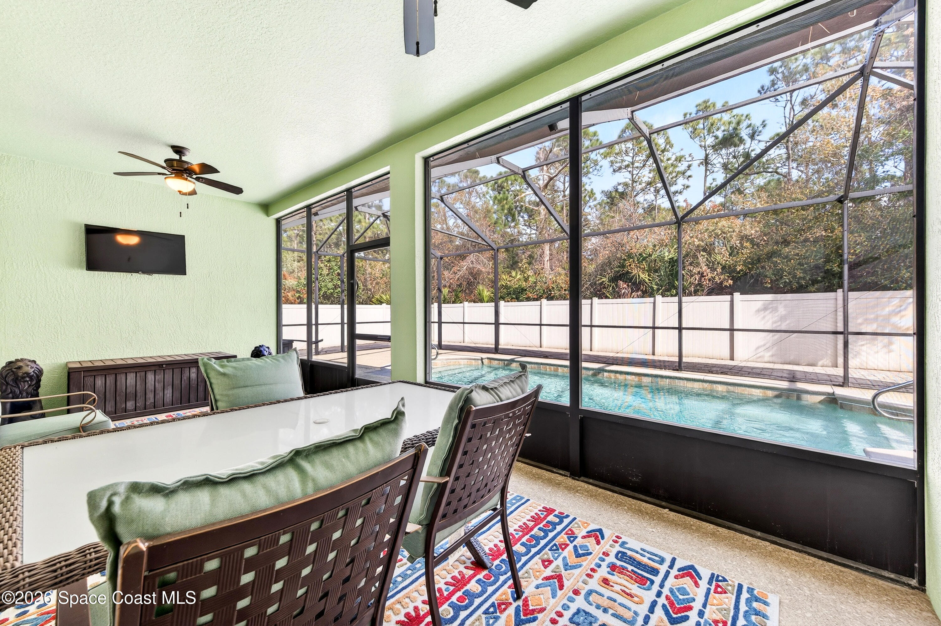 3347 Slate Street Melbourne, FL 32904 - Photo 37 of 48 Porch overlooking Pool/Privacy Fence