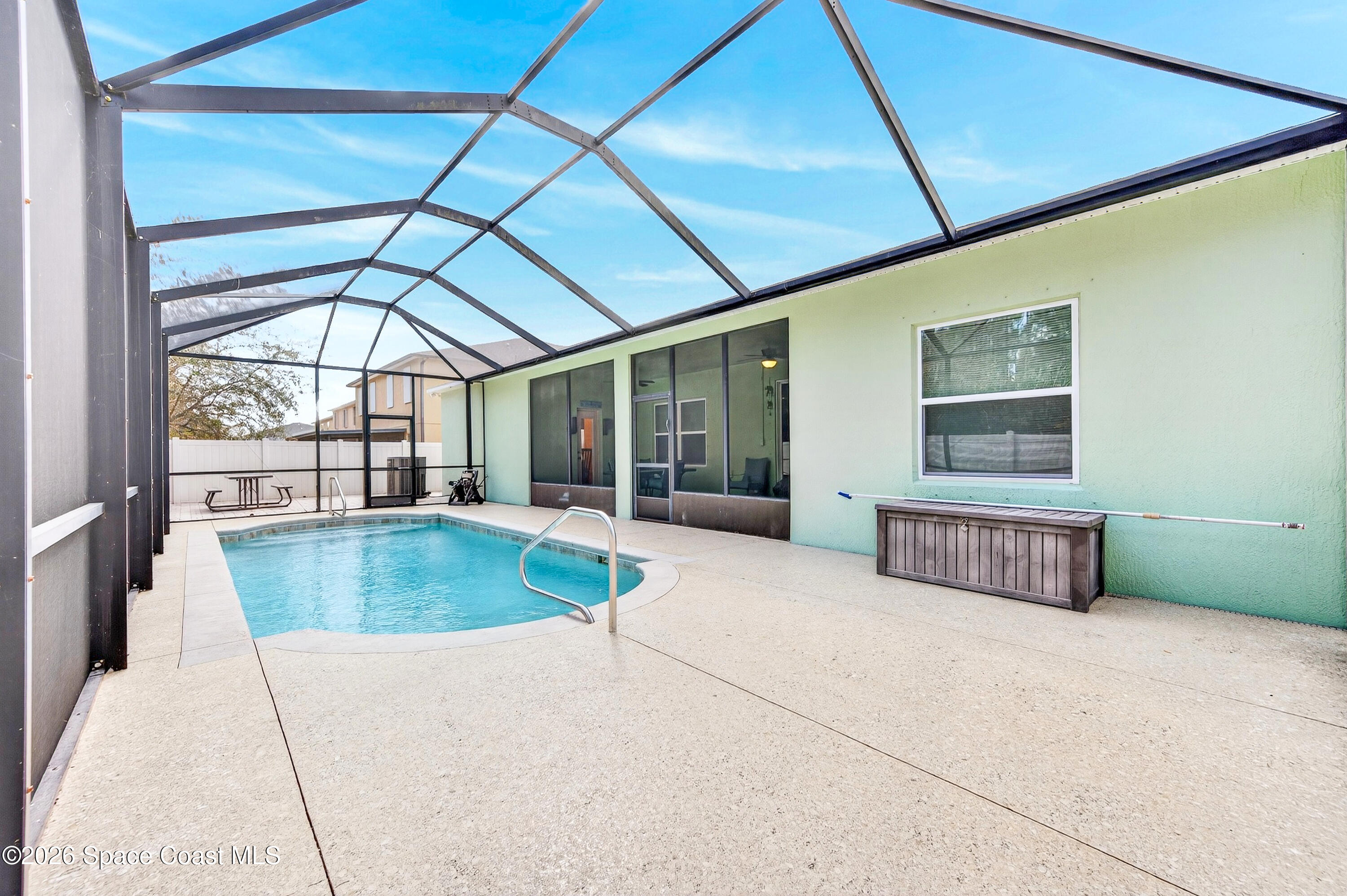 3347 Slate Street Melbourne, FL 32904 - Photo 39 of 48 2024 Pool Screen Enclosure/Master Window