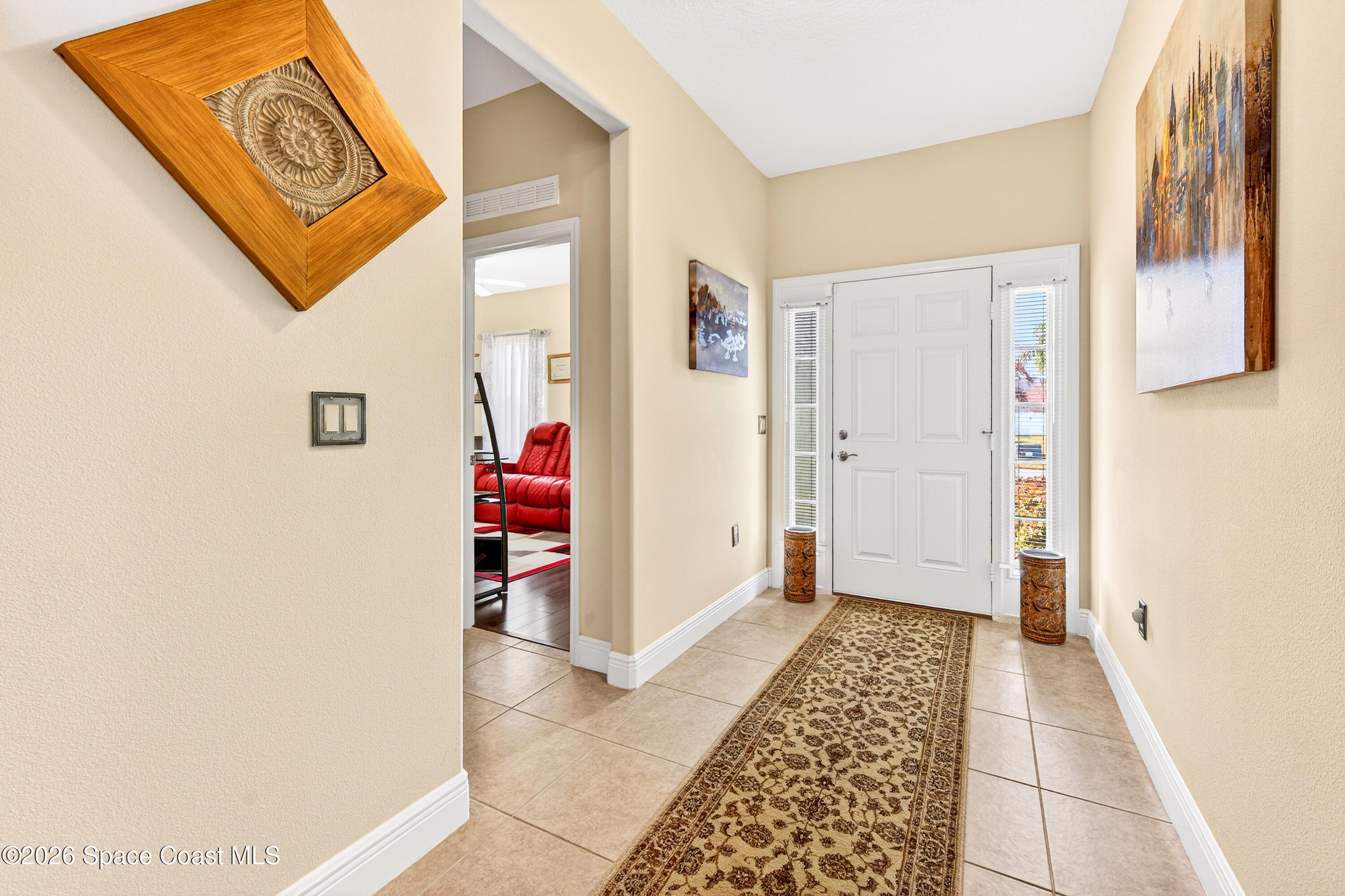 3347 Slate Street Melbourne, FL 32904 - Photo 6 of 48 Large Front Foyer w/Sidelights at Door