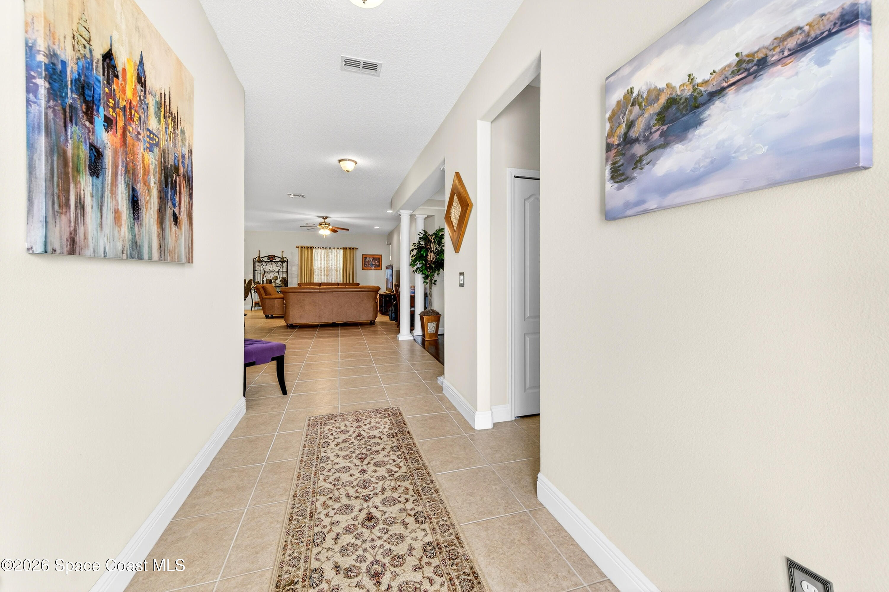 3347 Slate Street Melbourne, FL 32904 - Photo 48 of 48 Spacious Hallway leads to Open Floorplan