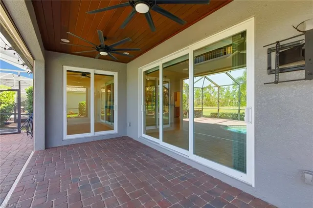 a view of a swimming pool with a porch