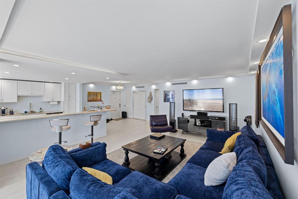 3100 Northeast 49th Street, Unit 206 Fort Lauderdale, FL 33308 - Photo 14 of 39 a living room with furniture and a view of kitchen