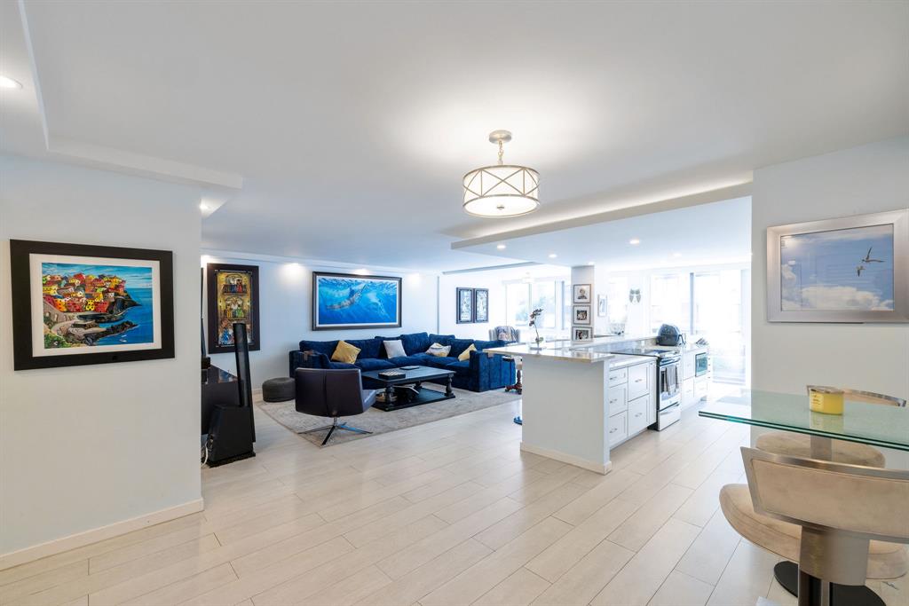 3100 Northeast 49th Street, Unit 206 Fort Lauderdale, FL 33308 - Photo 2 of 39 a view of a livingroom with furniture and window
