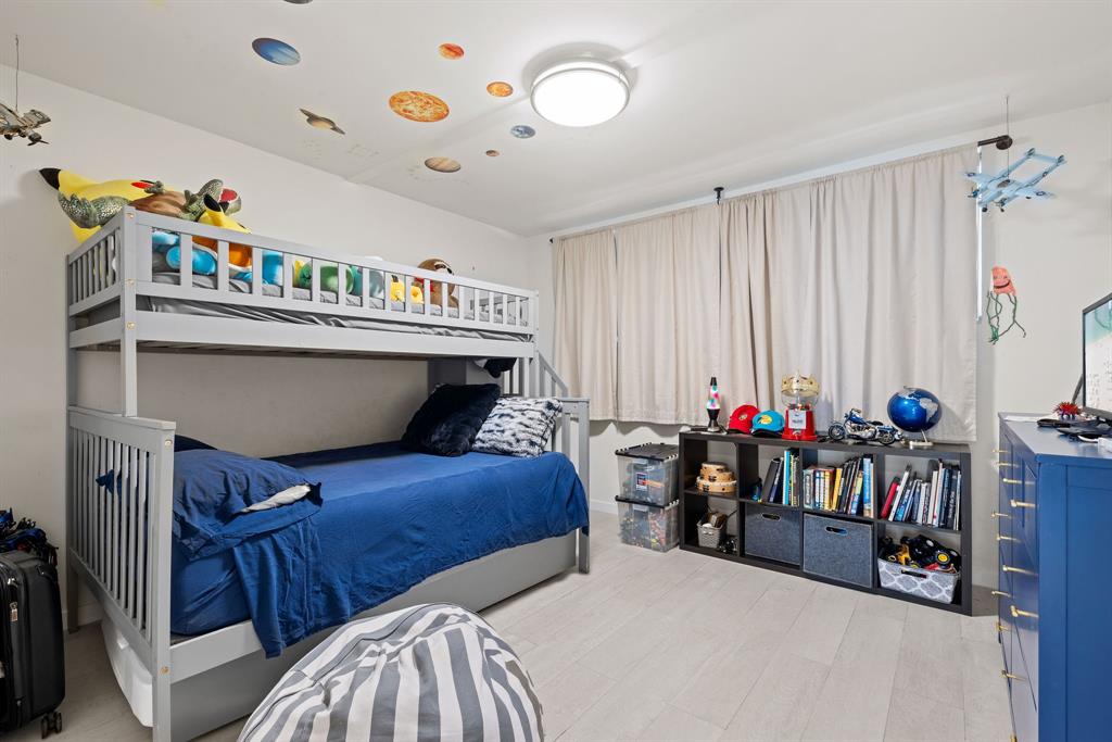 3100 Northeast 49th Street, Unit 206 Fort Lauderdale, FL 33308 - Photo 21 of 39 a living room with furniture and a window