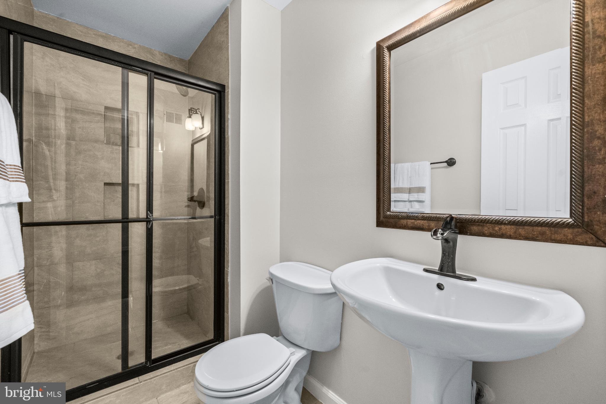 2233 Anvil Lane Temple Hills, MD 20748 - Photo 9 of 21 Modern Master bath with sleek glass shower.