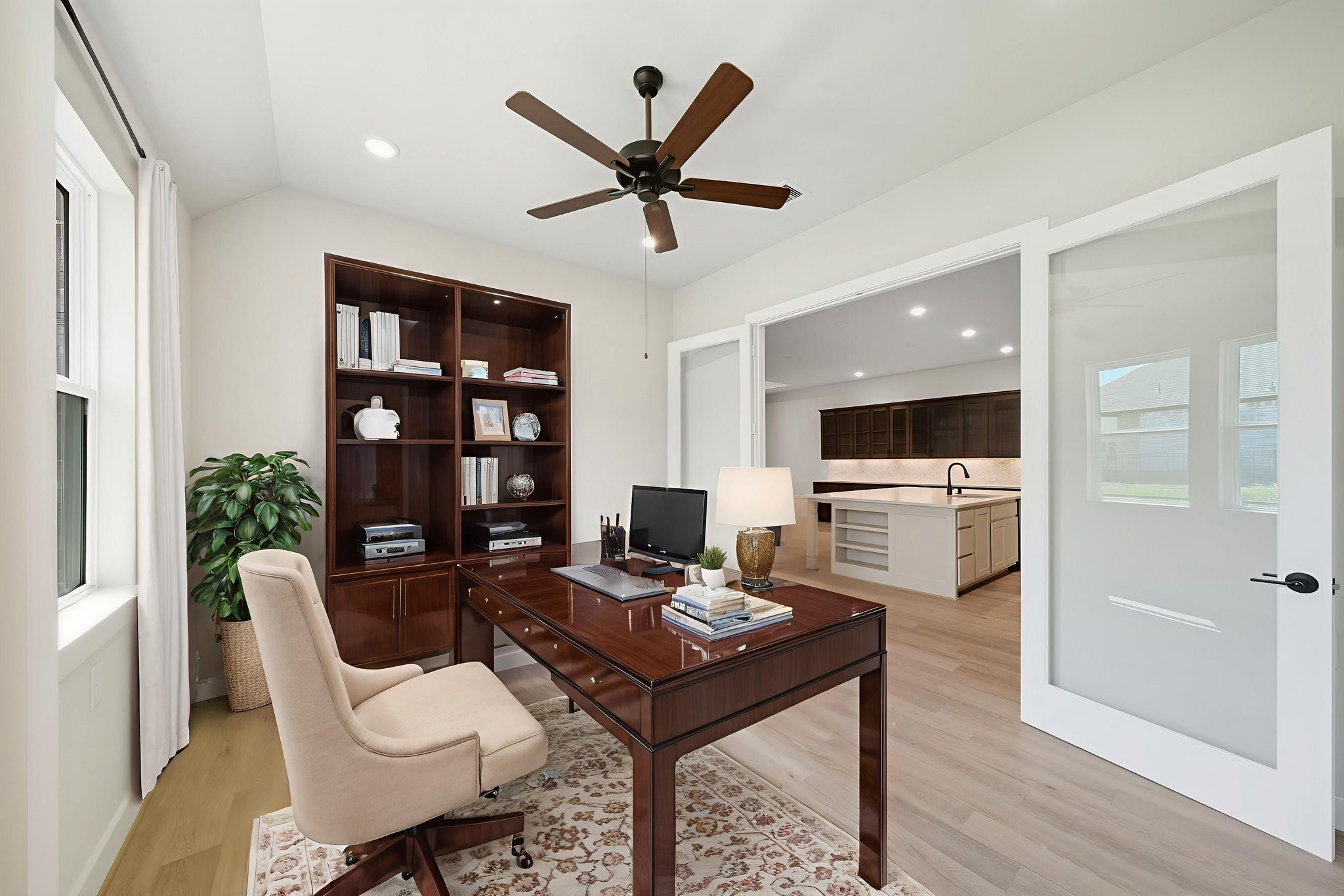 10041 Larkin Cove Willis, TX 77318 - Photo 10 of 48 a living room with furniture a rug and a flat screen tv