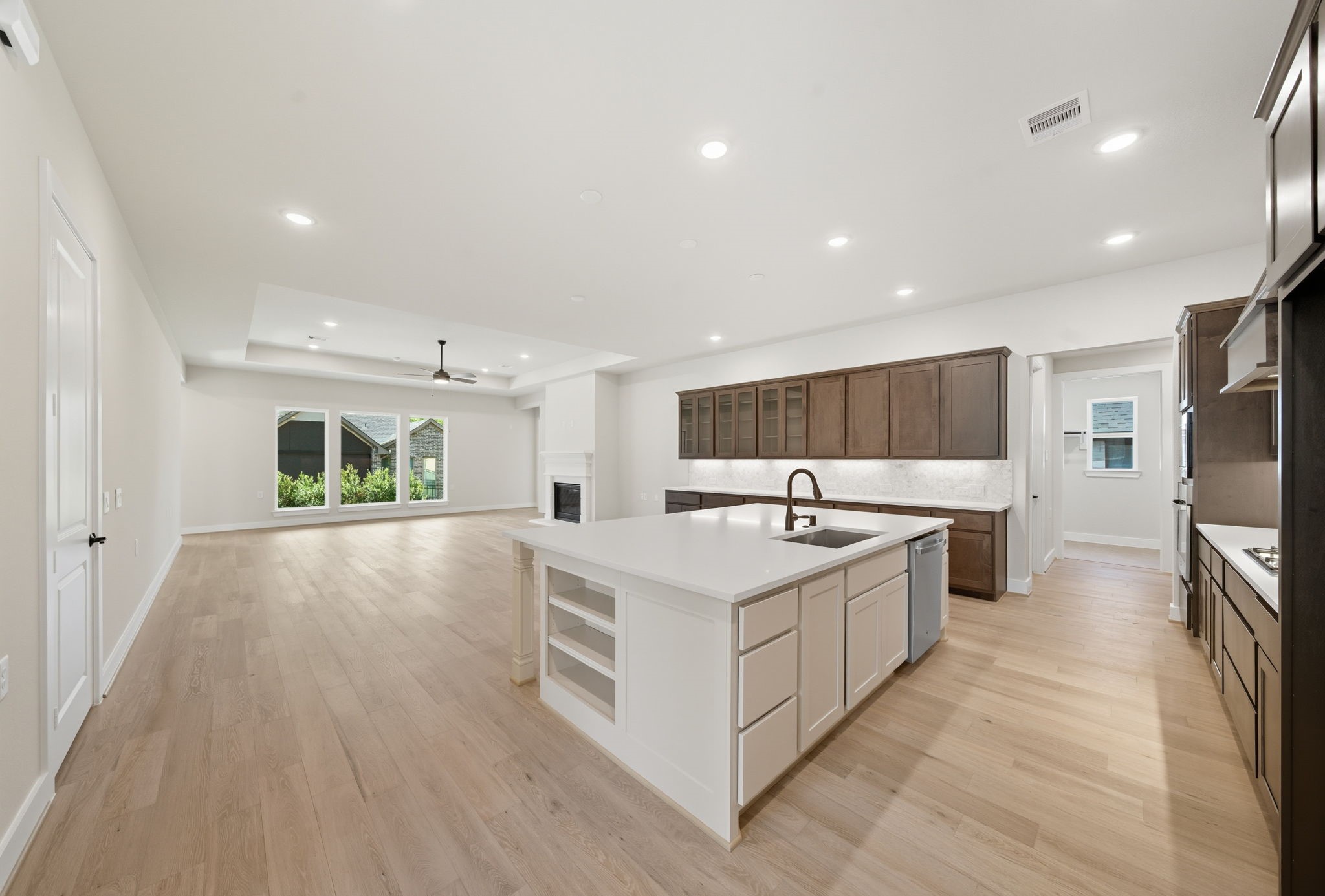 10041 Larkin Cove Willis, TX 77318 - Photo 17 of 48 a kitchen with a stove and a refrigerator