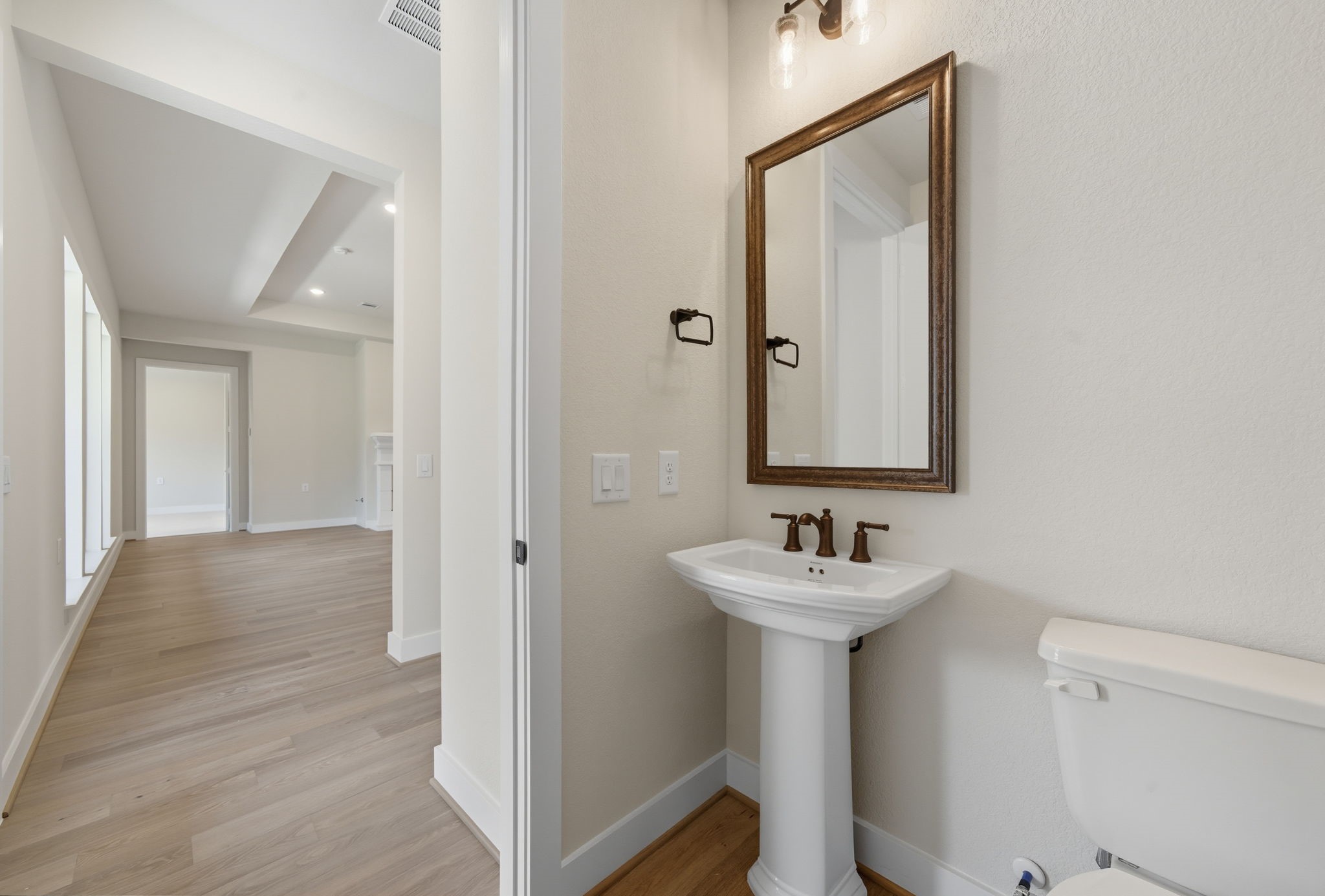 10041 Larkin Cove Willis, TX 77318 - Photo 19 of 48 a bathroom with a sink and a mirror
