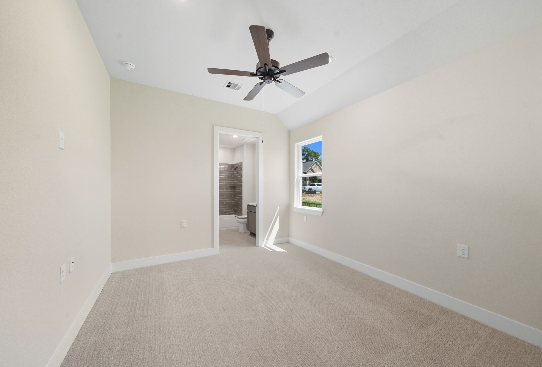 10041 Larkin Cove Willis, TX 77318 - Photo 30 of 48 a view of a livingroom with a ceiling fan and window