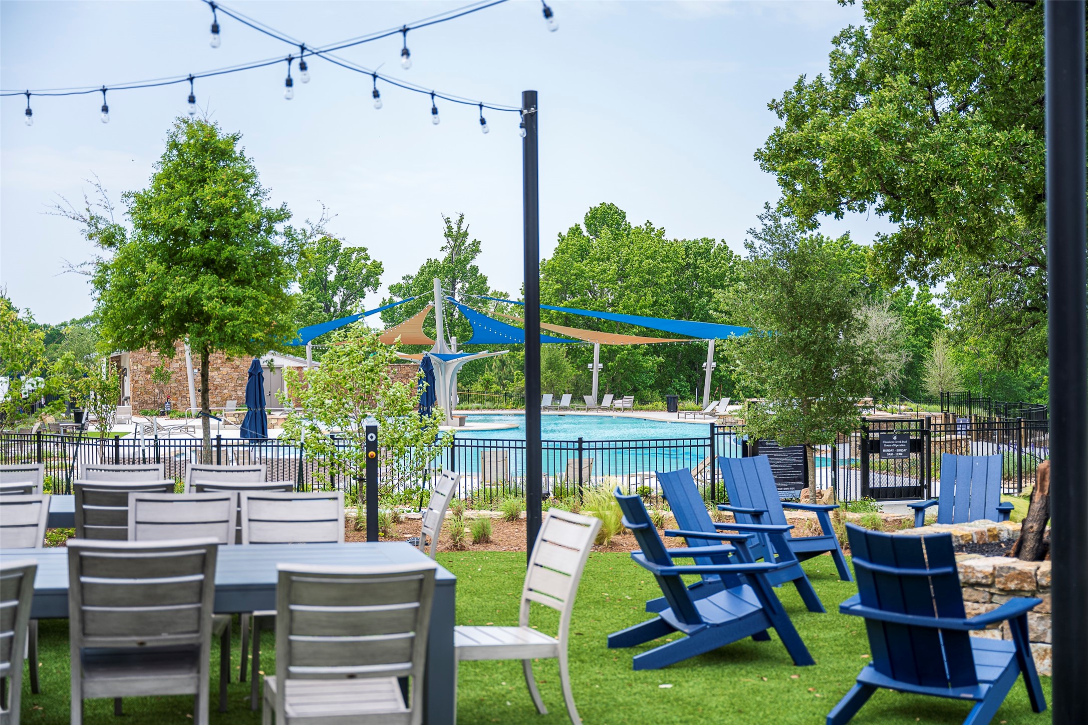 10041 Larkin Cove Willis, TX 77318 - Photo 44 of 48 a view of a chairs and table in patio