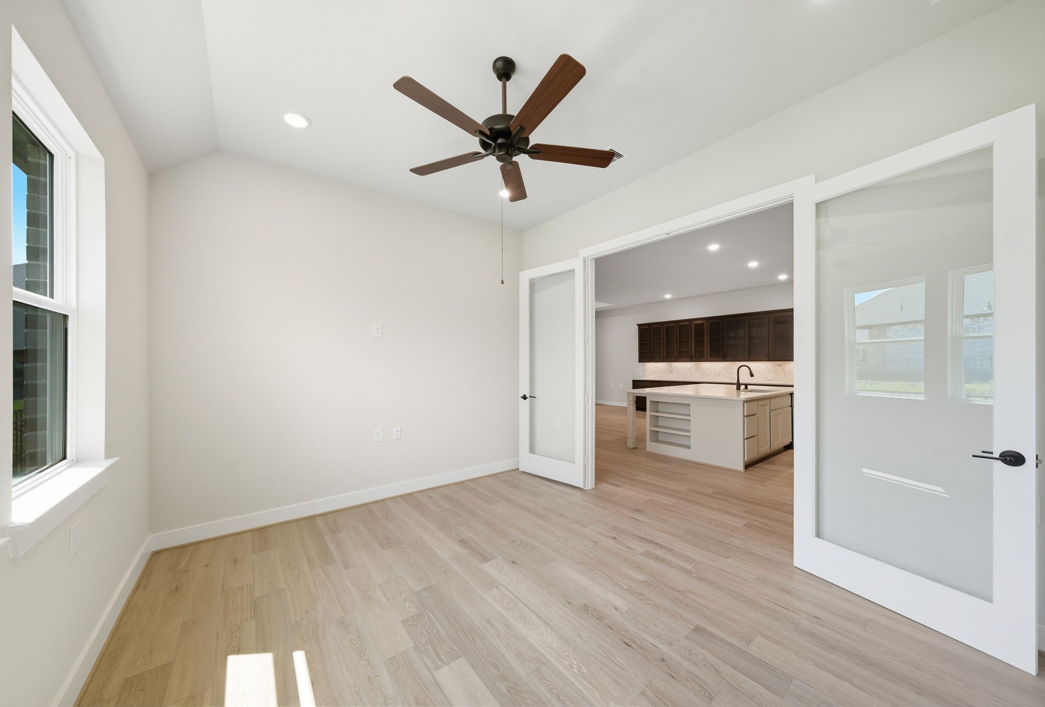 10041 Larkin Cove Willis, TX 77318 - Photo 9 of 48 a view of kitchen with sink and refrigerator