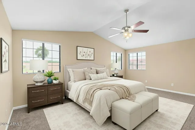 a bathroom with a granite countertop sink a toilet and a mirror