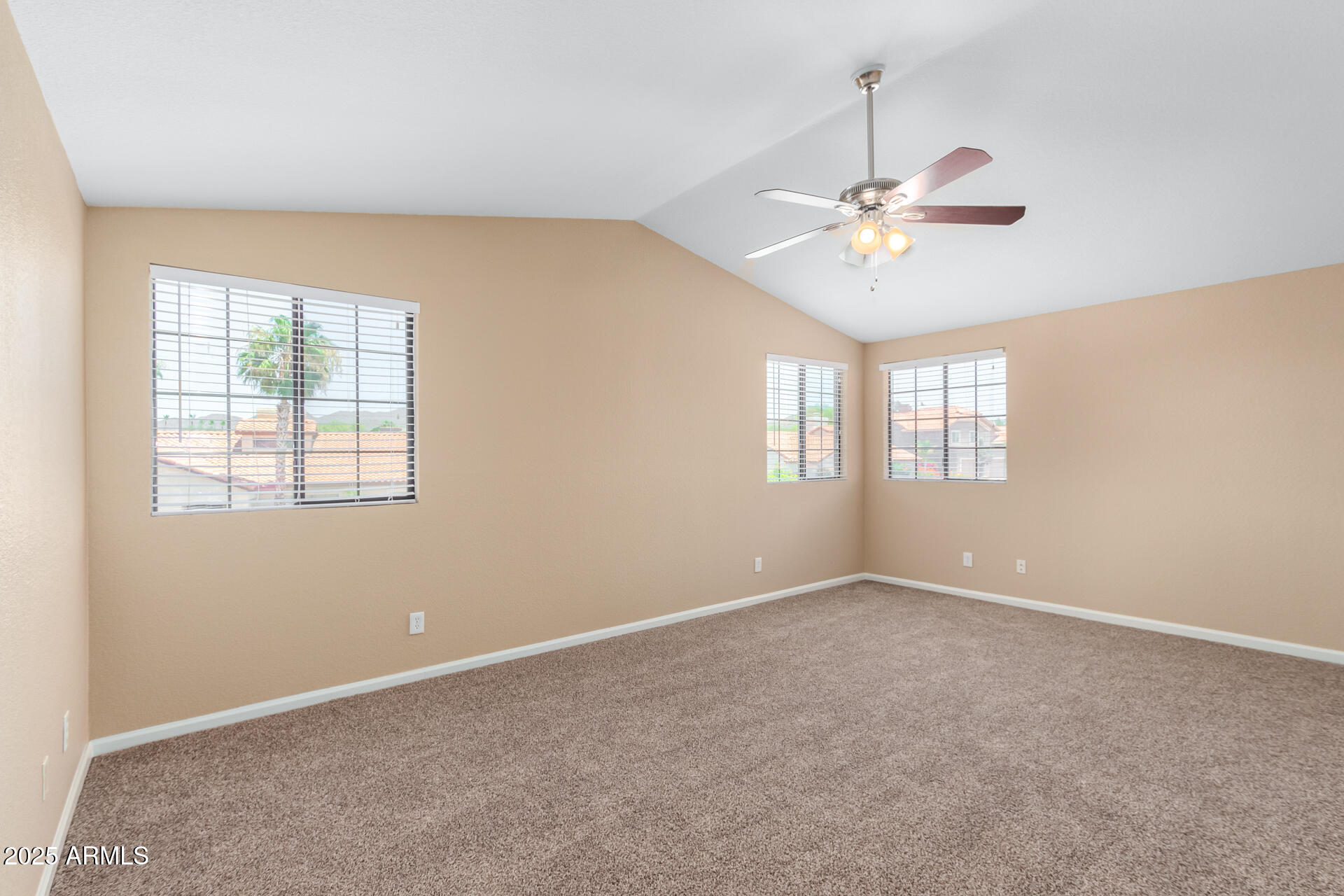 6121 East Saddleback Street Mesa, AZ 85215 - Photo 18 of 36 a view of an empty room with a window