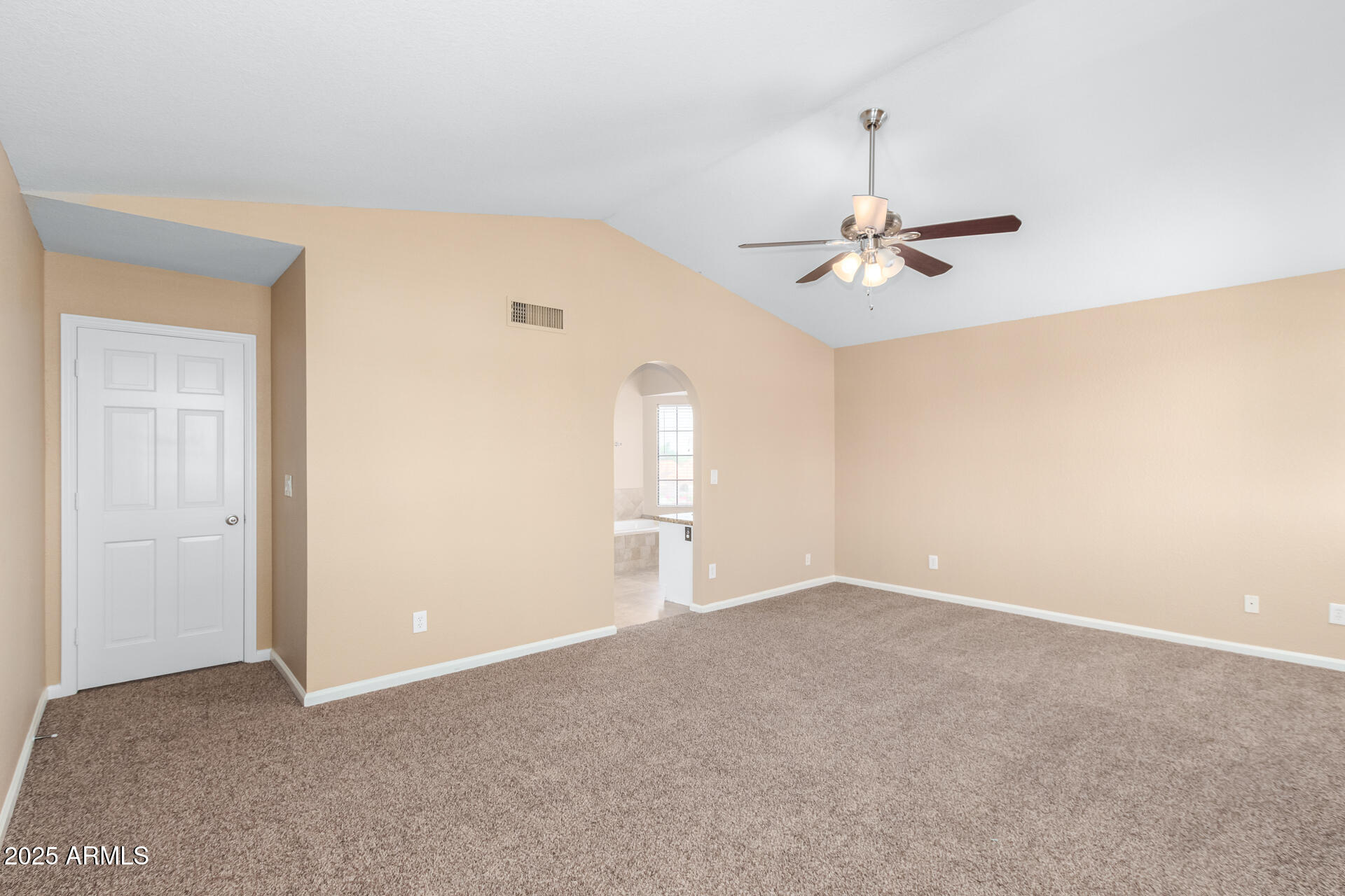6121 East Saddleback Street Mesa, AZ 85215 - Photo 19 of 36 an empty room with windows and fan
