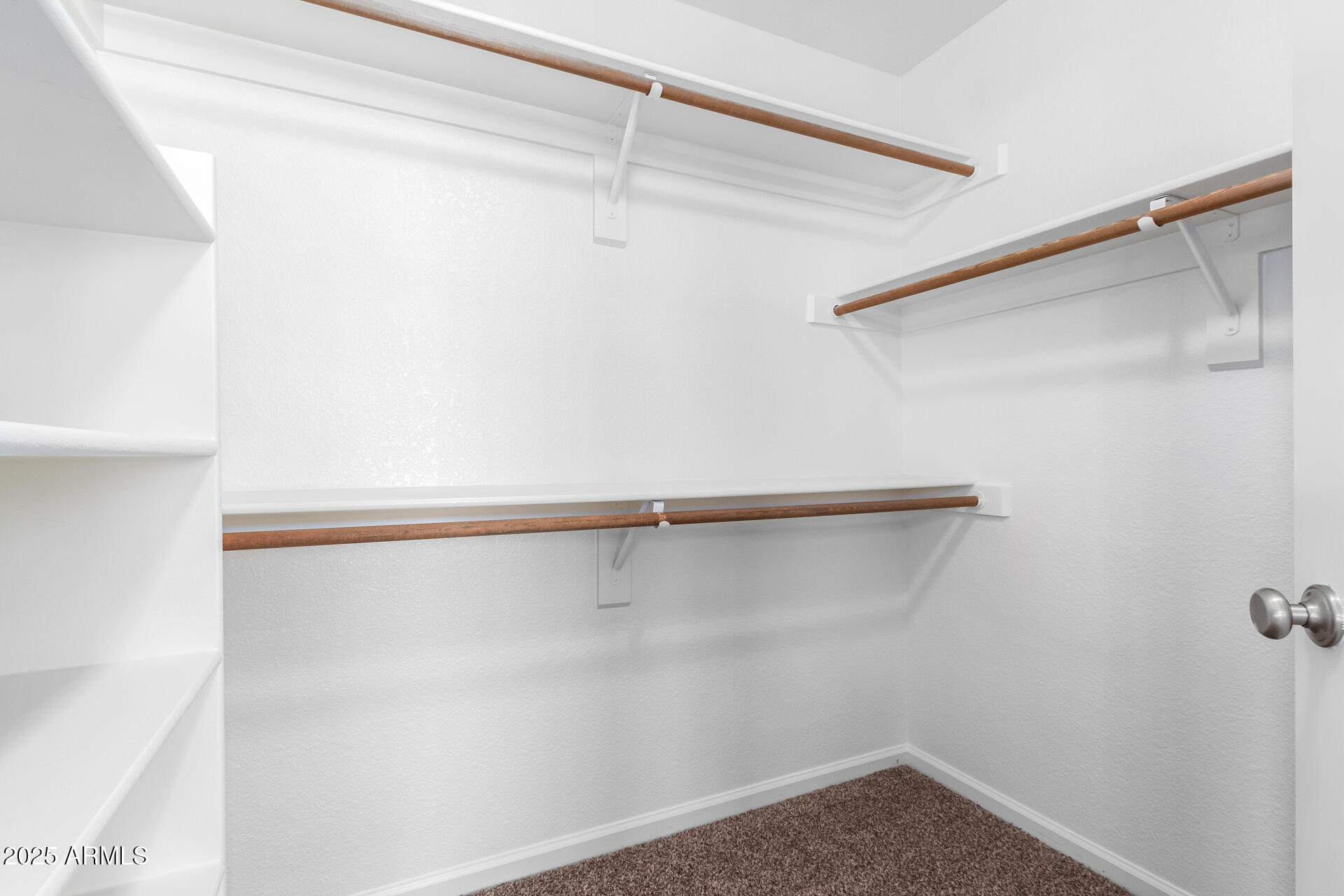 6121 East Saddleback Street Mesa, AZ 85215 - Photo 22 of 36 a view of small space with racks on the wall