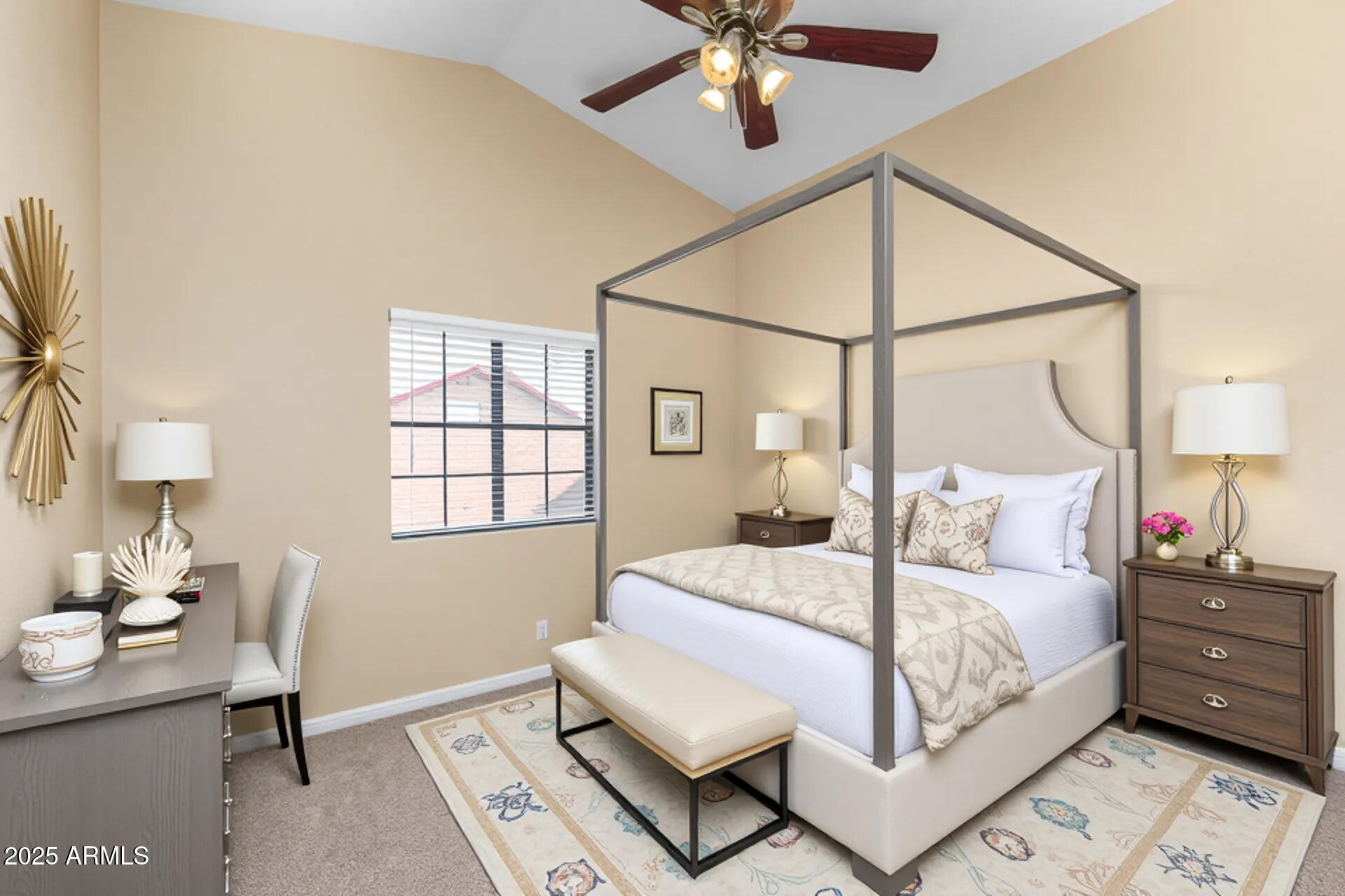 6121 East Saddleback Street Mesa, AZ 85215 - Photo 25 of 36 a bedroom with a bed and a chandelier