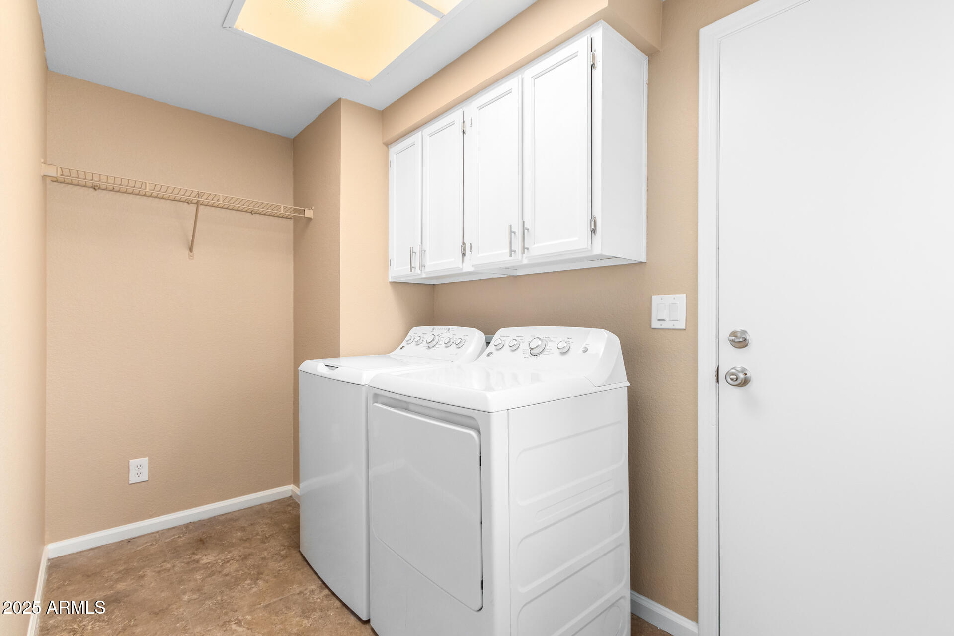 6121 East Saddleback Street Mesa, AZ 85215 - Photo 32 of 36 a utility room with dryer and washer