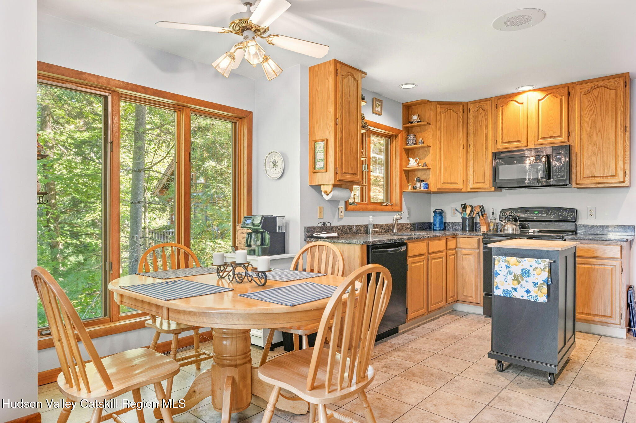 377 Tommy Trail Athens, NY 12015 - Photo 13 of 41 a dining room with granite countertop a sink dining table and chairs