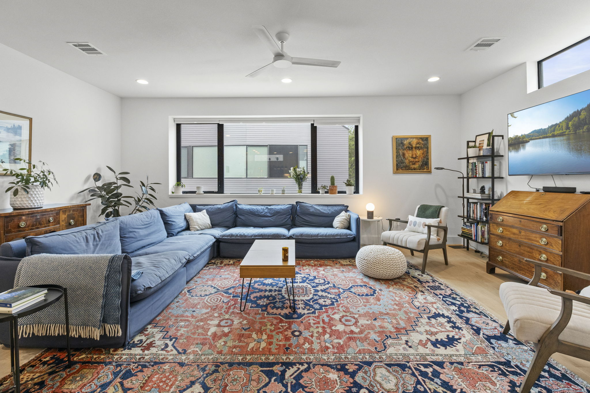 3406 East 17th Street, Unit 8 Austin, TX 78721 - Photo 1 of 1 a living room with furniture and a rug