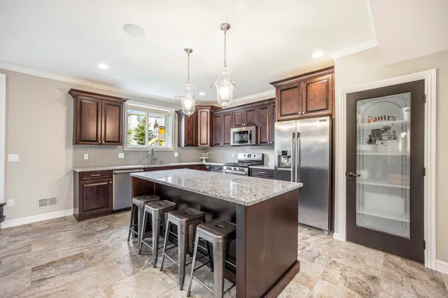 $969,900 | 56096 Lario Court, Macomb, MI 48042