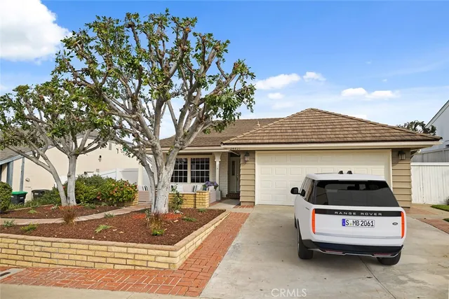 a car parked in front of a house