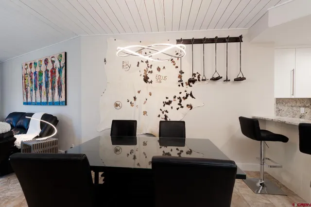 a view of a workspace with furniture