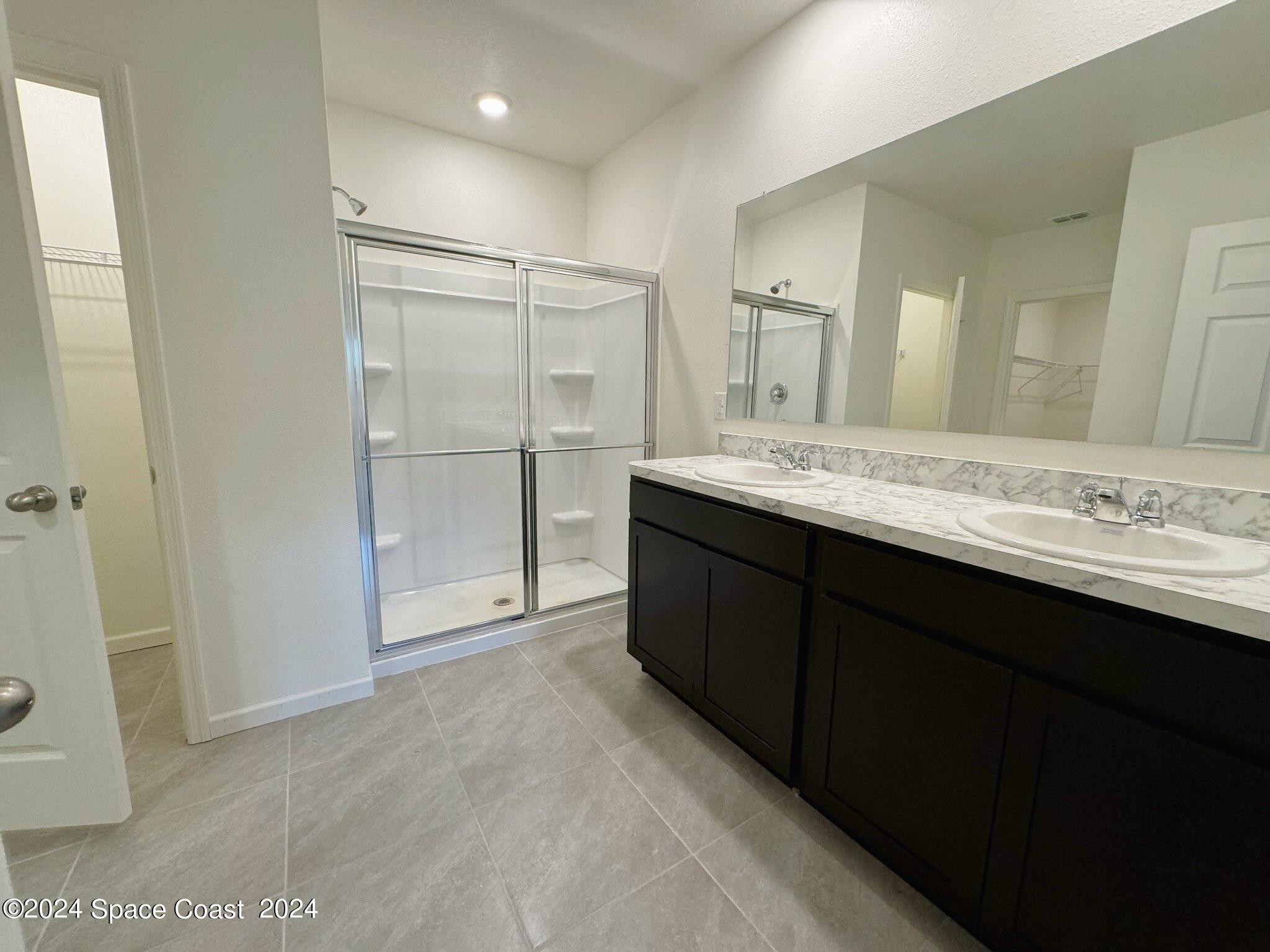 435 Oakleaf Street Southwest Palm Bay, FL 32908 - Photo 14 of 44 14. 435 Oakleaf - Owners Bath.1