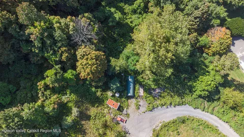 a view of a house with a tree